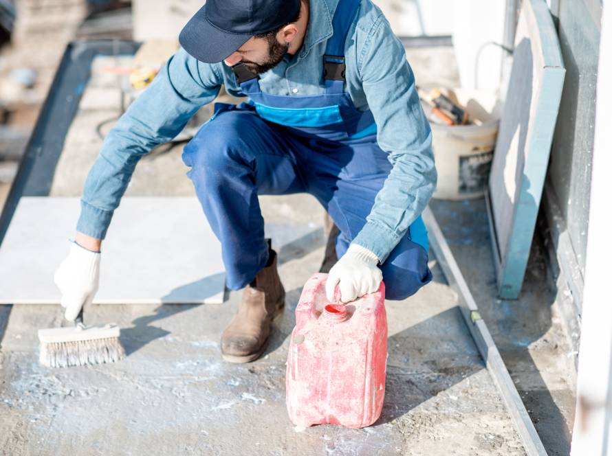 construction-worker-applying-primer-with-brush-on-2026-03-25-00-29-38-utc (1)
