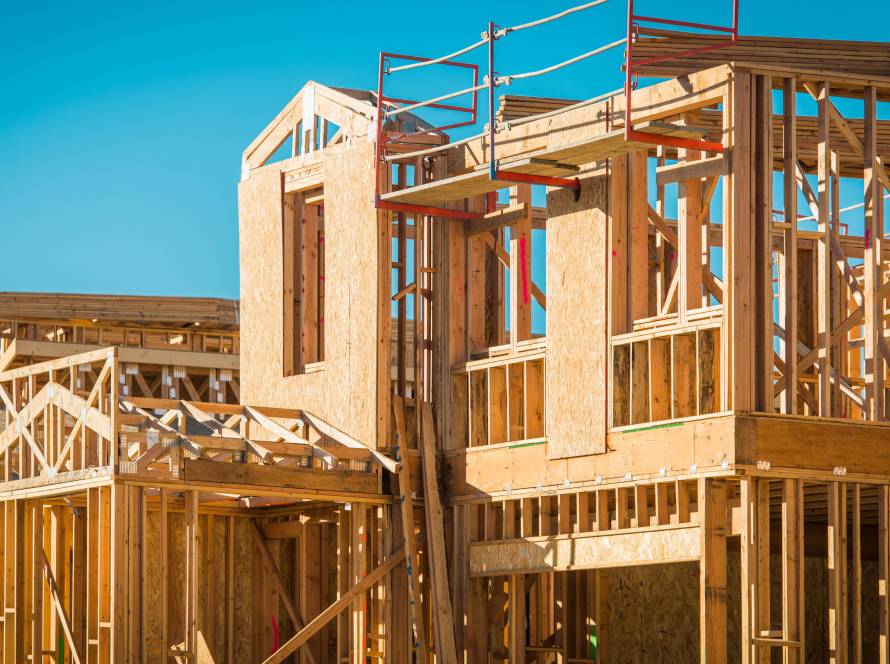 new-home-construction-site-with-wood-framework-2026-03-20-02-20-53-utc (1) (1)